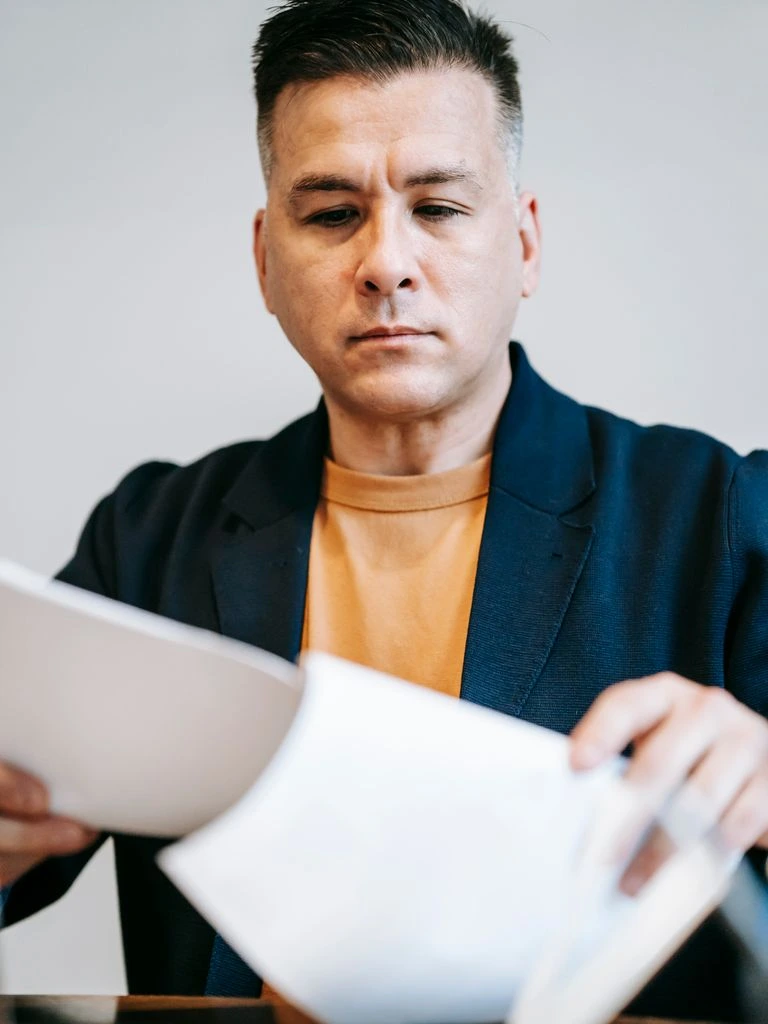 A procurement manager reviewing tiered pricing tables against forecasted spend.